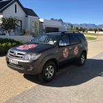 Harvest Room signs vehicle branding