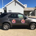 Harvest Room signs vehicle branding